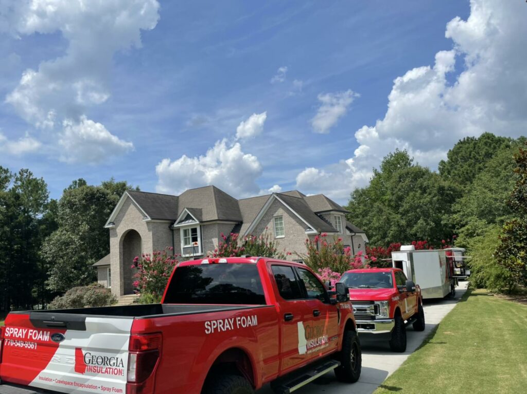 Georgia Insulation team working in a house